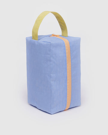 french blue dopp kit with yellow handle and light orange zipper trim