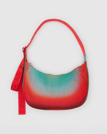 red and teal acid rain print medium crescent bag with bright red strap