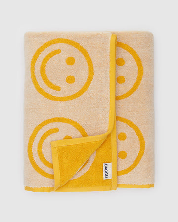 folded two-toned marigold smiley towel