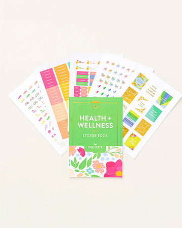 health + wellness themed sticker book fanned on a table
