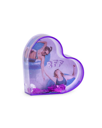 purple see through heart shaped photo frame with floating confetti inside