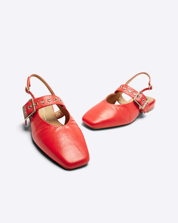 cherry red slingback flat with large grommet buckle and square toe
