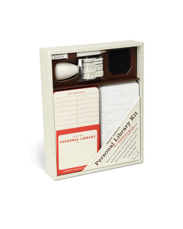 packaged personal library kit: 20 self-adhesive pockets and checkout cards, date stamp and inkpad, pencil