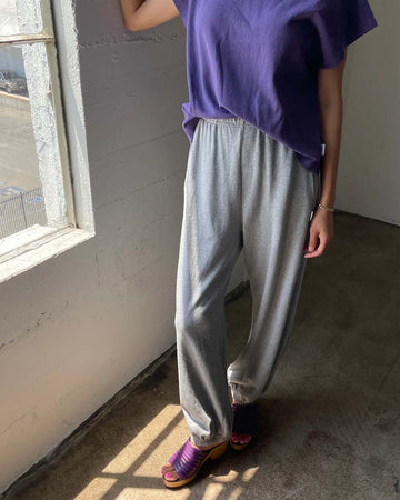 model wearing heather grey cotton balloon pants