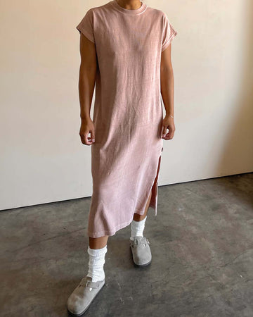model wearing macchiato jeanne dress with cap sleeves and side slit