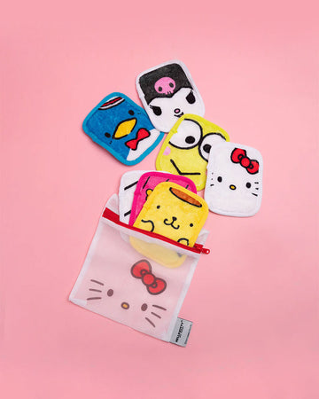 set of 7 makeup erasers with hello kitty and friends faces and wash bag