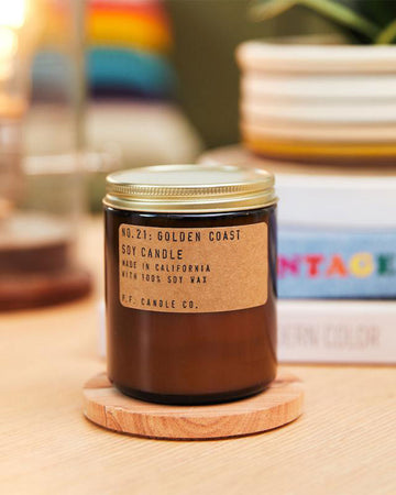 golden coast soy candle in amber jar