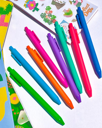 set of 8 colorful gel pens on paper