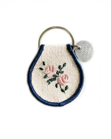 cream patch keychain with light pink rose  print and navy trim