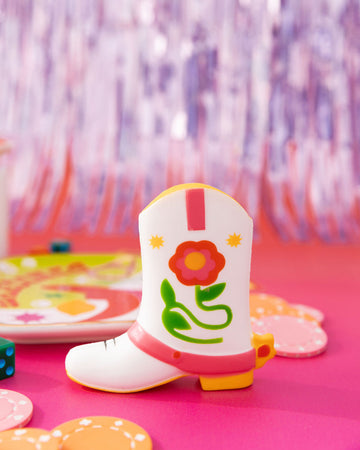 white cowboy boot de-stress ball with pink and yellow floral accents