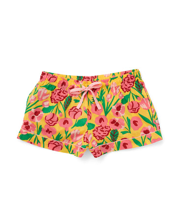 pajama shorts in yellow with pink and green floral pattern and pink tie waistl