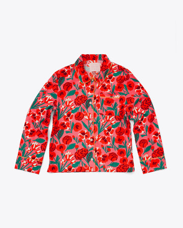 long sleeve pajama shirt in pink and red bold floral print with yellow piping detail and white flower buttons