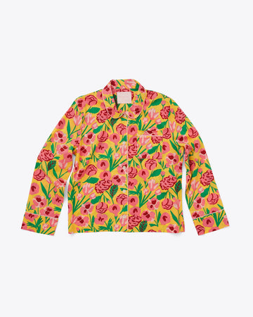 long sleeve pajama shirt in yellow with bold pink and green floral print with yellow piping detail and yellow buttons