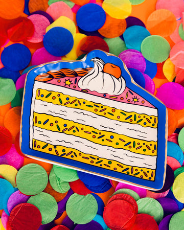 pink and yellow layered cake trinket tray with blue ground
