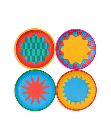 set of four dessert plate set with vibrant color blocking