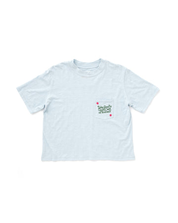 blue slub tee with a patch pocket and the words take really good care of yourself 